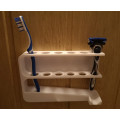 Toothbrush and razor stand with drying