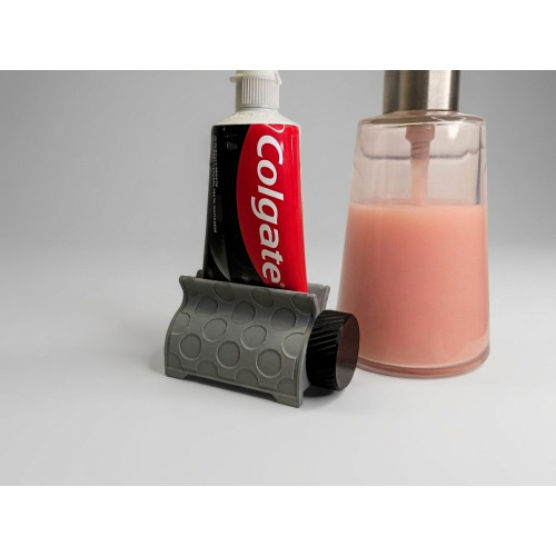 Toothpaste dispenser - external mechanism