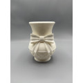Decorative spring vase with ribbon