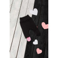 Black pants with pink feet