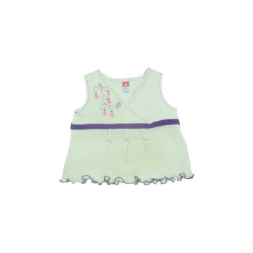 Cream dress with a violet ribbon