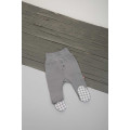 Grey trousers with checkered feet 